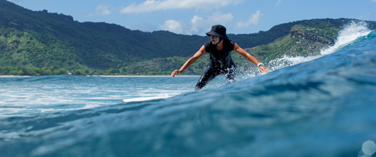 surfer on a blue wave.